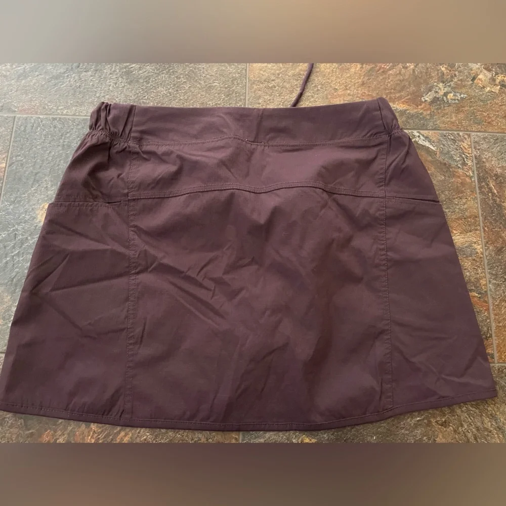 Women’s Te Verde dark purple active tennis pickleball skirt with pockets.Medium